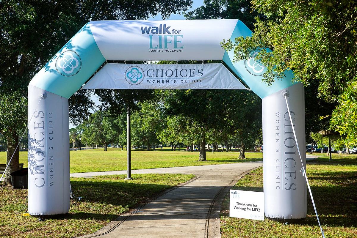 Inflatable at Finish Line custom inflatable walk for life arch outdoors across walking path