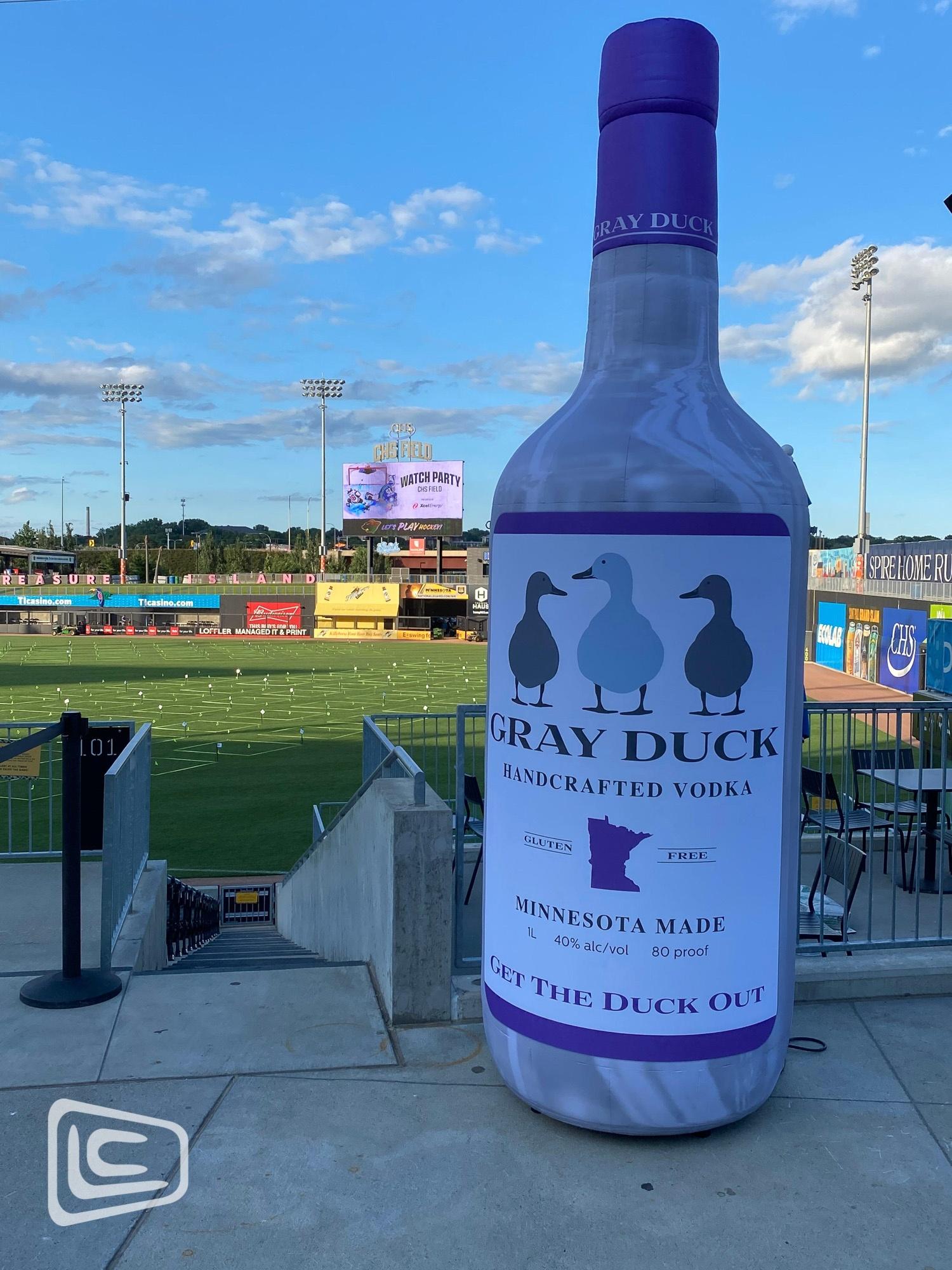 custom inflatable Gray Duck Vodka Bottle at Baseball Game